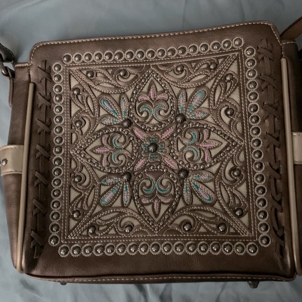 Montana west cross body bag gently used